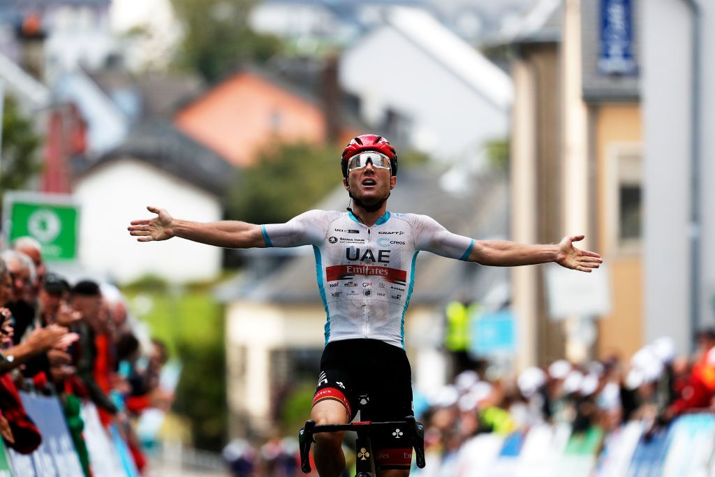 ESCHSURSRE LUXEMBOURG SEPTEMBER 15 Marc Hirschi of Switzerland and UAE Team Emirates white best young rider jersey celebrates at finish line as stage winner during the 81st SkodaTour De Luxembourg 2021 Stage 2 a 1861km stage from Steinfort to EschSurSre Eschdorf 504m skodatour skodatour on September 15 2021 in EschSurSre Luxembourg Photo by Bas CzerwinskiGetty Images