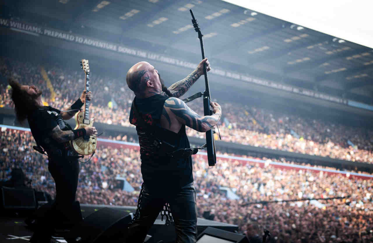 Slayer&amp;rsquo;s Gary Holt and Kerry King performing onstage at the Back To The Beginning show at Villa Park in July 2025