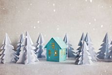 A model house in forest with snow 