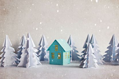 A model house in forest with snow 