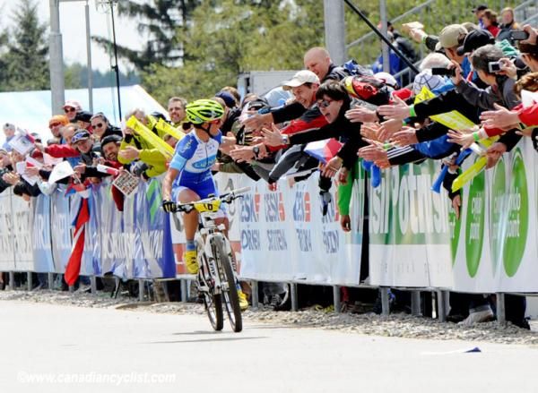 Katerina Nash (Luna Pro Team) greets the fans after finishing 3rd