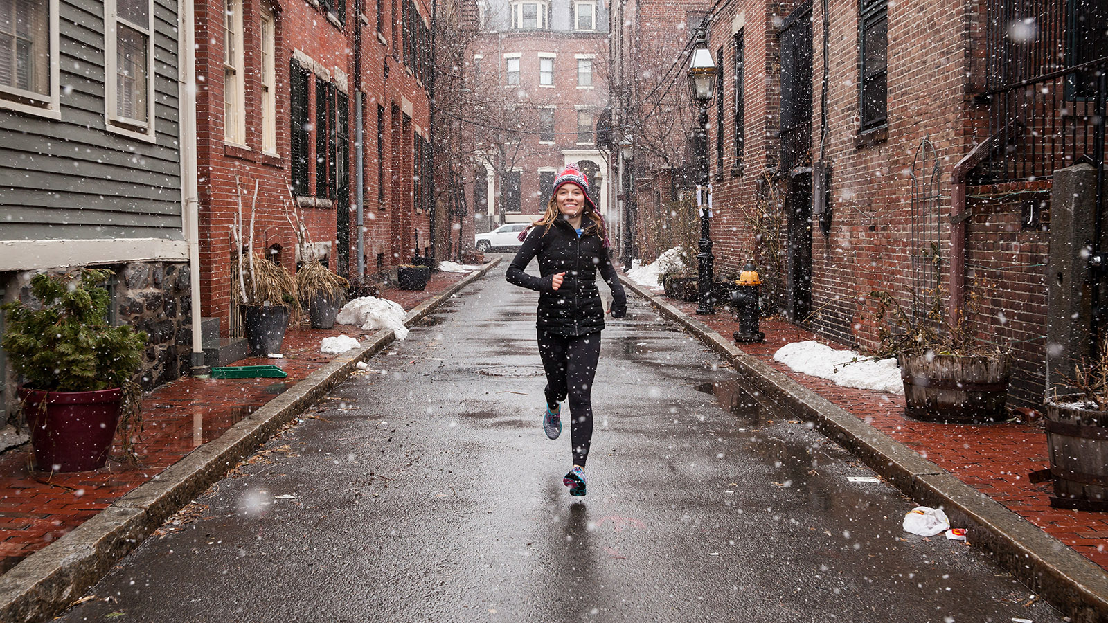 College Girl Running in Snowstorm