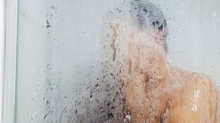 Man in a steamy shower