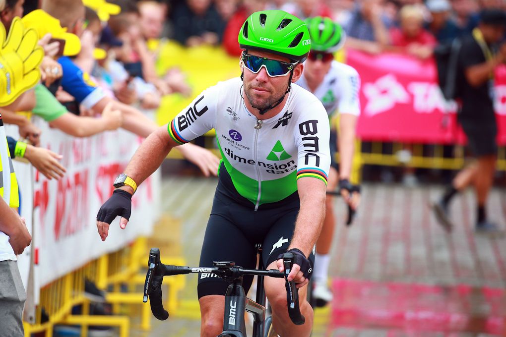 Mark Cavendish rides to the start of stage 1 in Poland