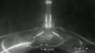SpaceX's veteran Falcon 9 rocket first stage booster is seen after making a record 10th landing on the drone ship Of Course I Still Love You following the Starlink 26 mission launch on May 9, 2021.