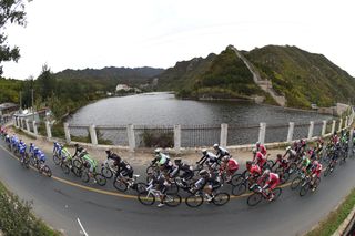 The peloton passes the Great Wall on stage three of the 2014 Tour of Beijing