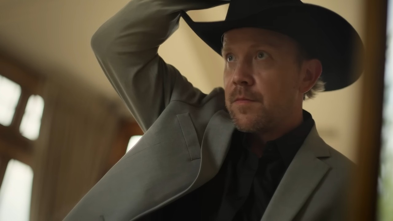 Kaleb adjusting his hat on Million Dollar Secret.