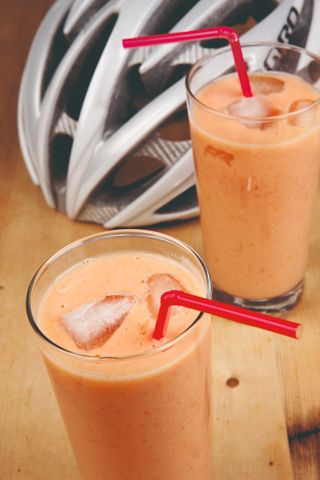 Smoothie next to a helmet