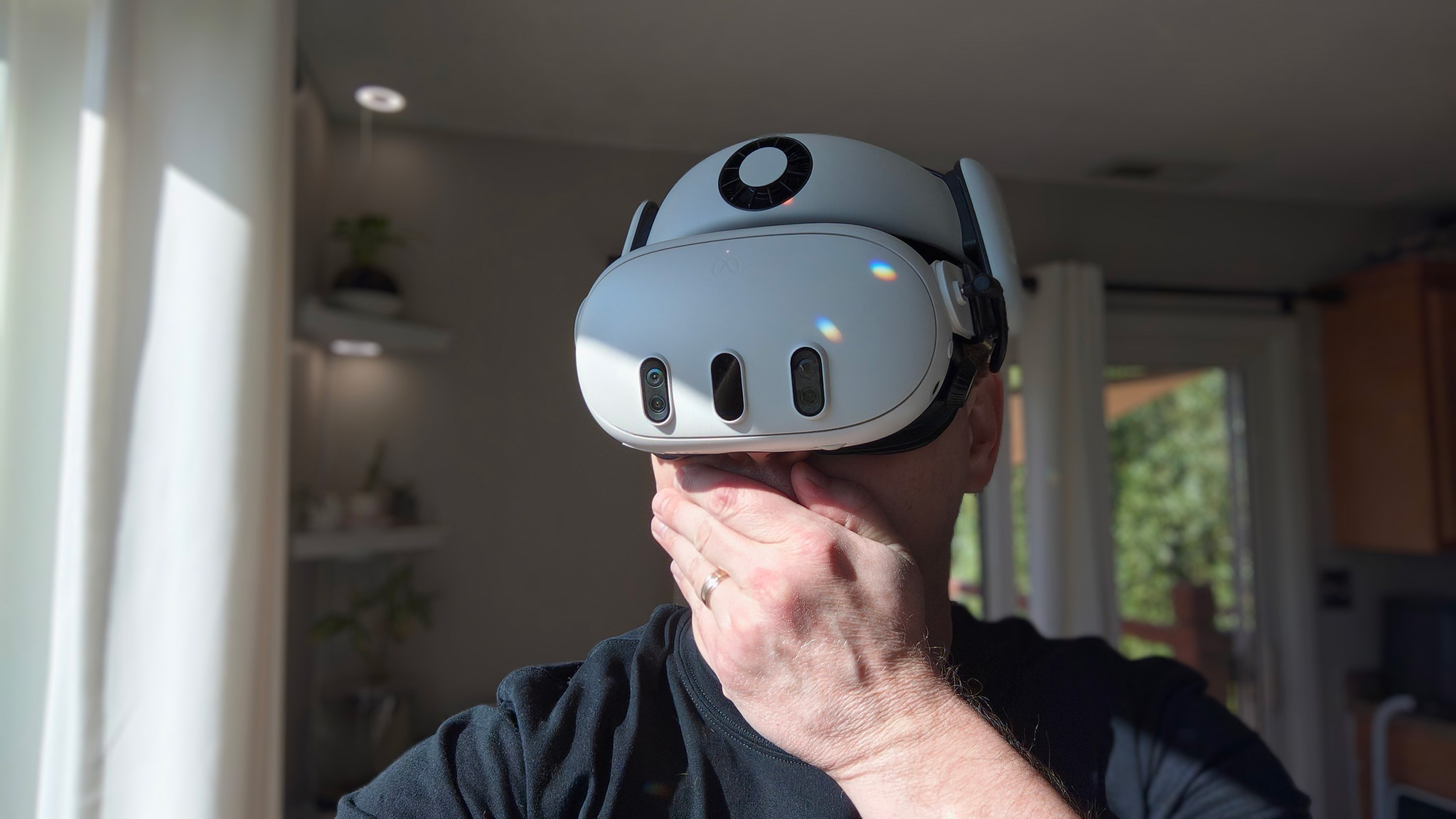 Holding my hand over my mouth while wearing a Meta Quest 3 with a BoboVR S3 Pro head strap