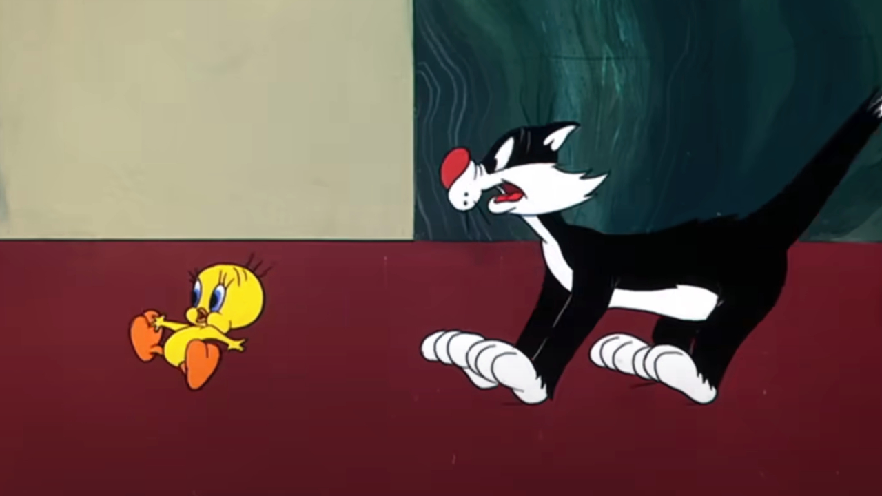 Sylvester chasing Tweety in a Looney Tunes short