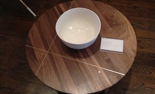 Ceramic bowl on wooden table