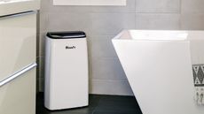 Wood's MDK26 dehumidifier in a bathroom