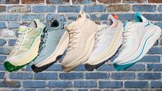Five hoka shoes presented on a blue brick background