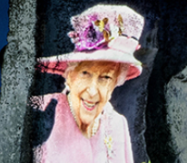 A closeup of one of the photos of the Queen projected onto Stonehenge