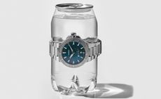 Oris X Bracenet watch on a jar full of water