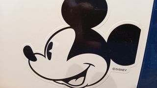 A photo of the Disney logo on the Brother cutting machine