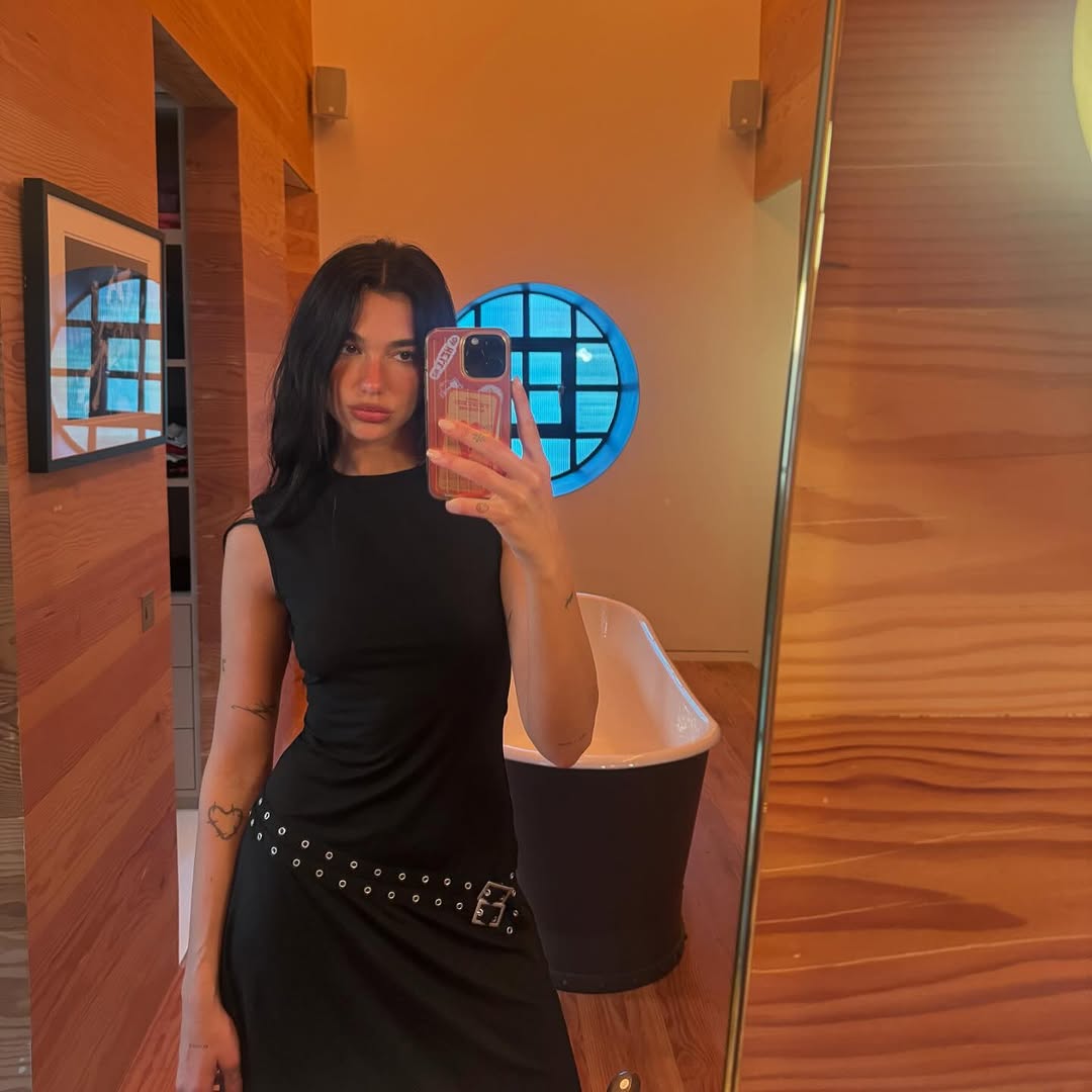 Dua Lipa wore a black With J&amp;eacute;an mini dress on Instagram in May 2025