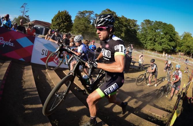 Jeremy Durrin (Neon Velo) running the stairs on lap two