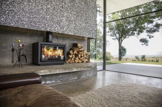 Are wood burners bad for the environment? wood burner in a modern house