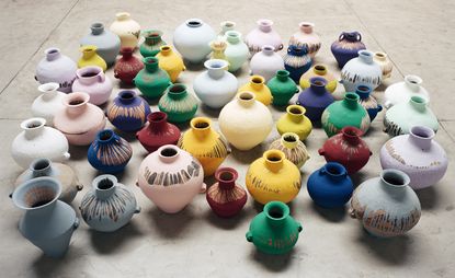 Coloured Vases arranged on the floor