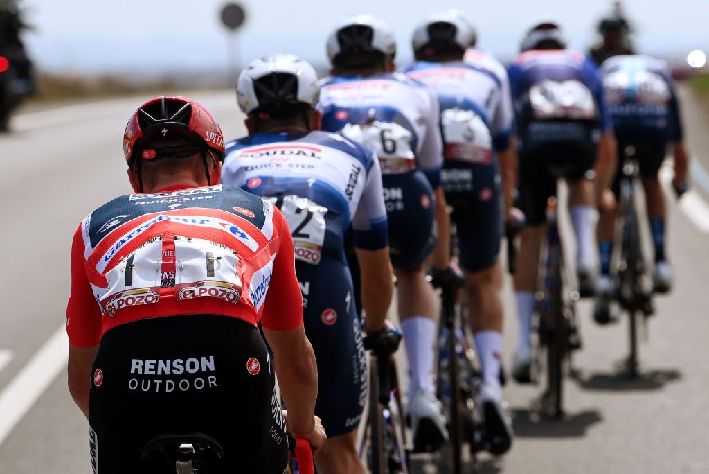 TARRAGONA SPAIN AUGUST 29 Detailed view of Remco Evenepoel of Belgium and Team Soudal Quick Step Red Leader Jersey competes during the 78th Tour of Spain 2023 Stage 4 a 1846km stage from Andorra la Vella to Tarragona UCIWT on August 29 2023 in Tarragona Spain Photo by Tim de WaeleGetty Images