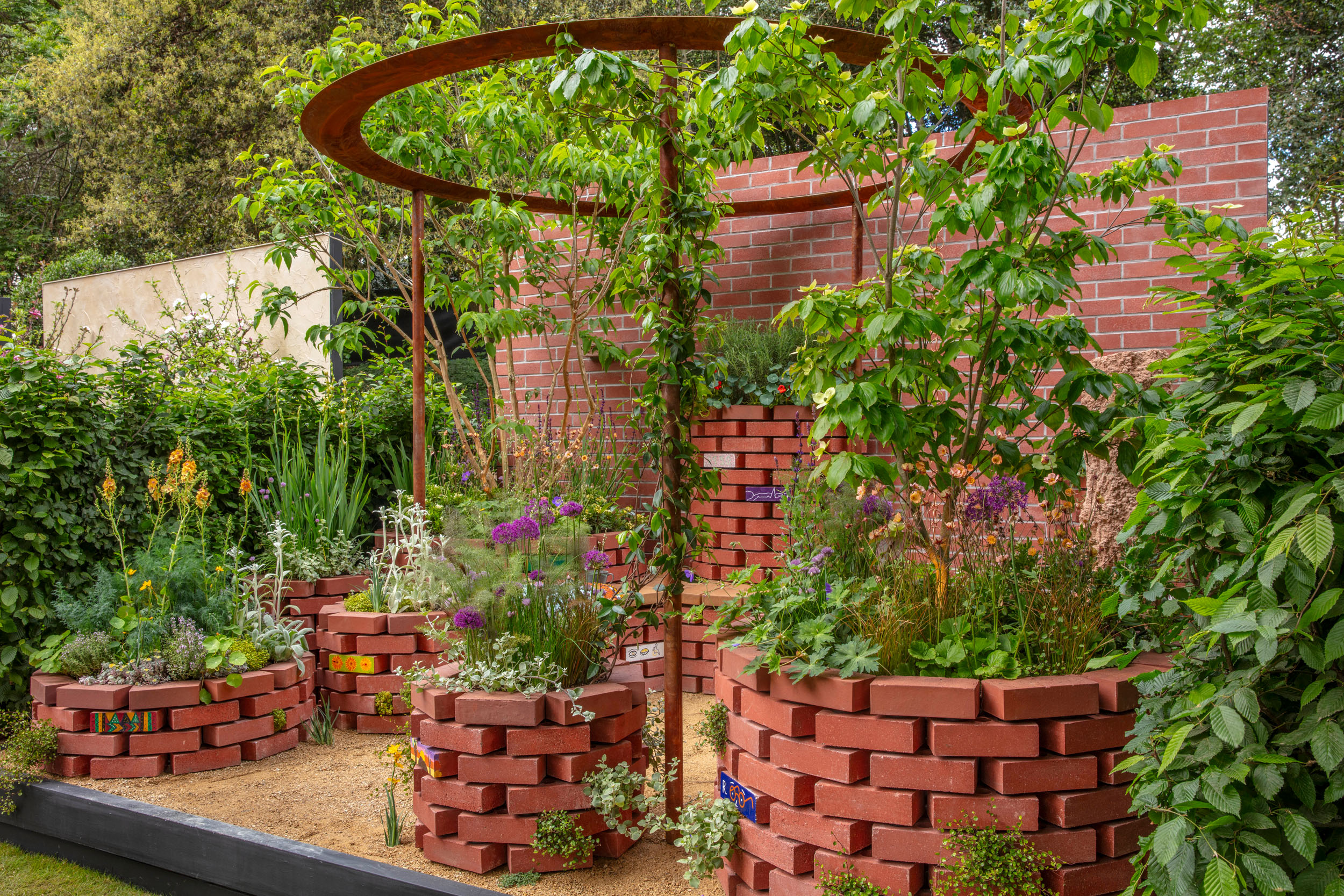 The Sightsavers Garden: We Start With Sight But We Don&amp;rsquo;t Stop There &amp;mdash; container garden by Peter Karn, Sarah Fisher and Janice Molyneux at RHS Chelsea Flower Show 2026