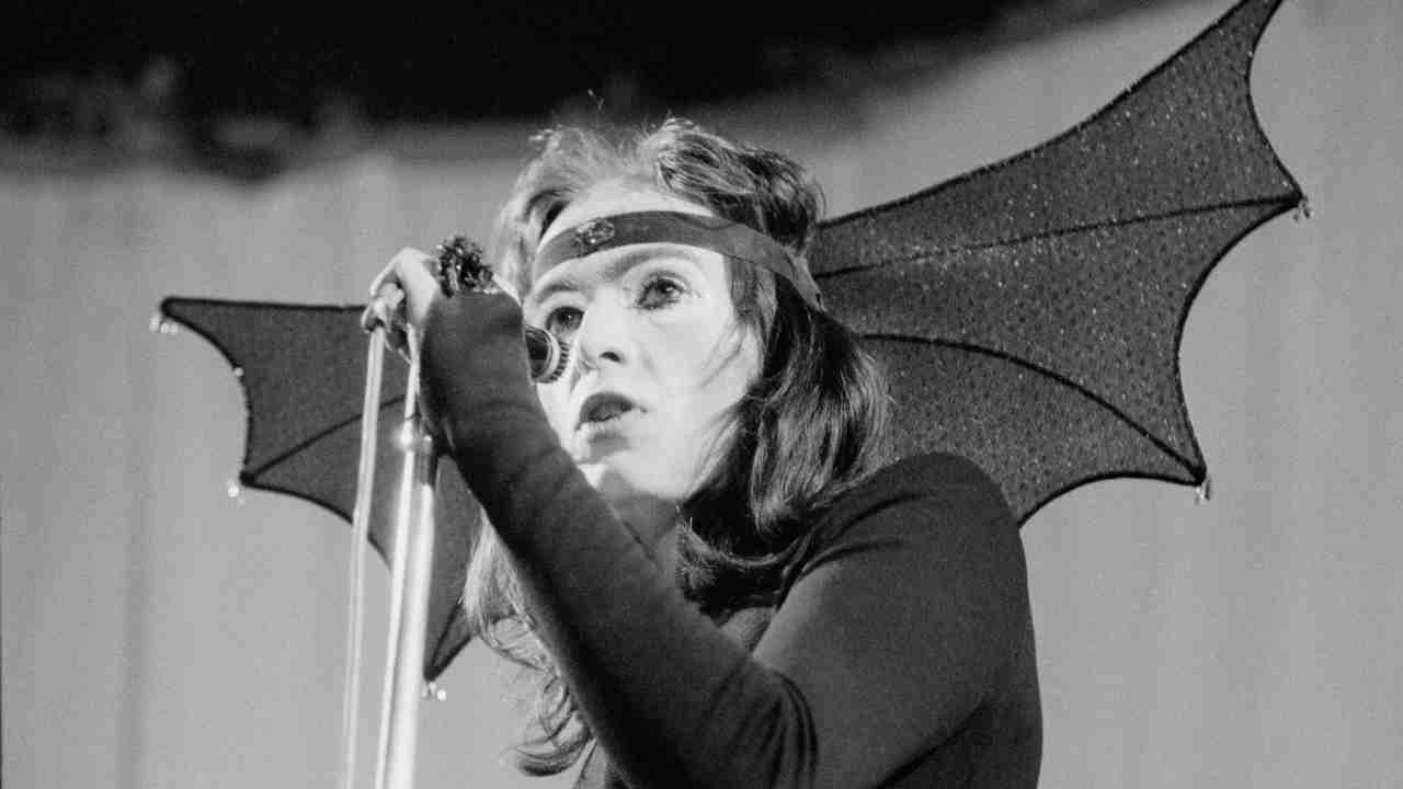 Genesis singer Peter Gabriel performing onstage in 1972