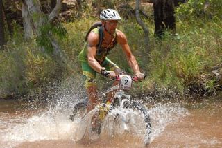 Kai Hundertmark (Dream Team) blasts through a river crossing.