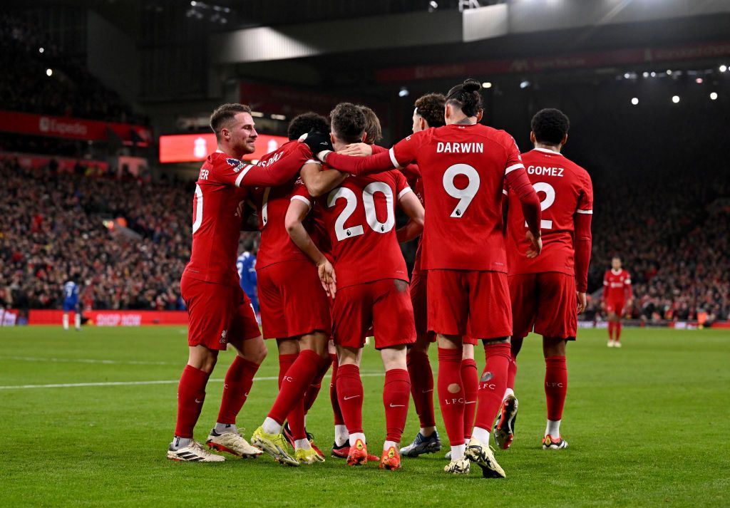 Diogo Jota of Liverpool celebrates after scoring the opening goal during the Premier League match between Liverpool FC and Chelsea FC at Anfield on January 31, 2024 in Liverpool, England.