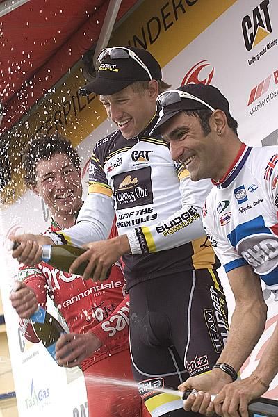 The stage five podium (l-r): William Clarke (2nd,Praties), Richard Lang (1st,Budget Forklifts), and Kristian House (3rd,GHD-Burnie).