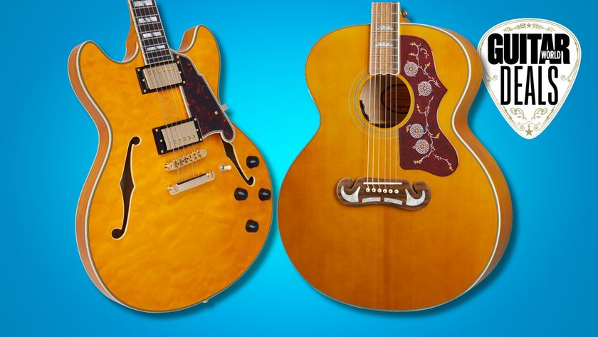 A D&#039;Angelico semi hollow guitar and an Epiphone acoustic on a blue background