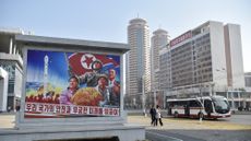 A patriotic mural on a street in the Hwasong area of Pyongyang