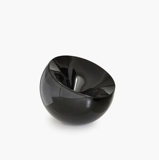 A black bowl at an angle.