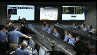 JPL mission managers wait nervously for news of the Mars rover Curiosity's landing