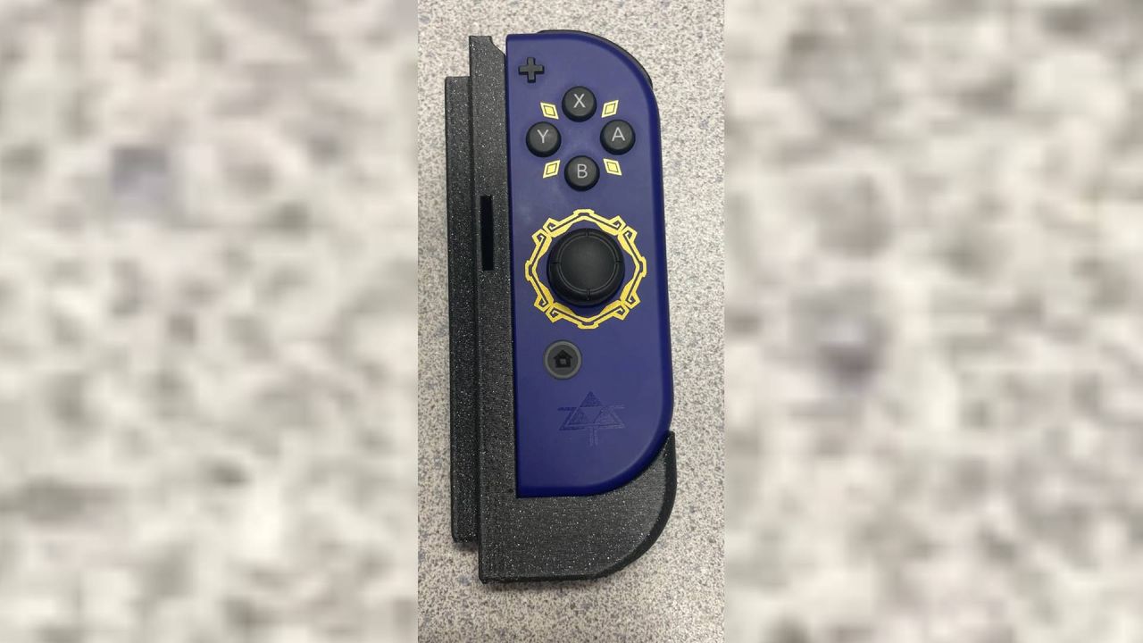 Zelda: Skyward Sword Joy-Con attached to Switch 2 3D printed adapter.