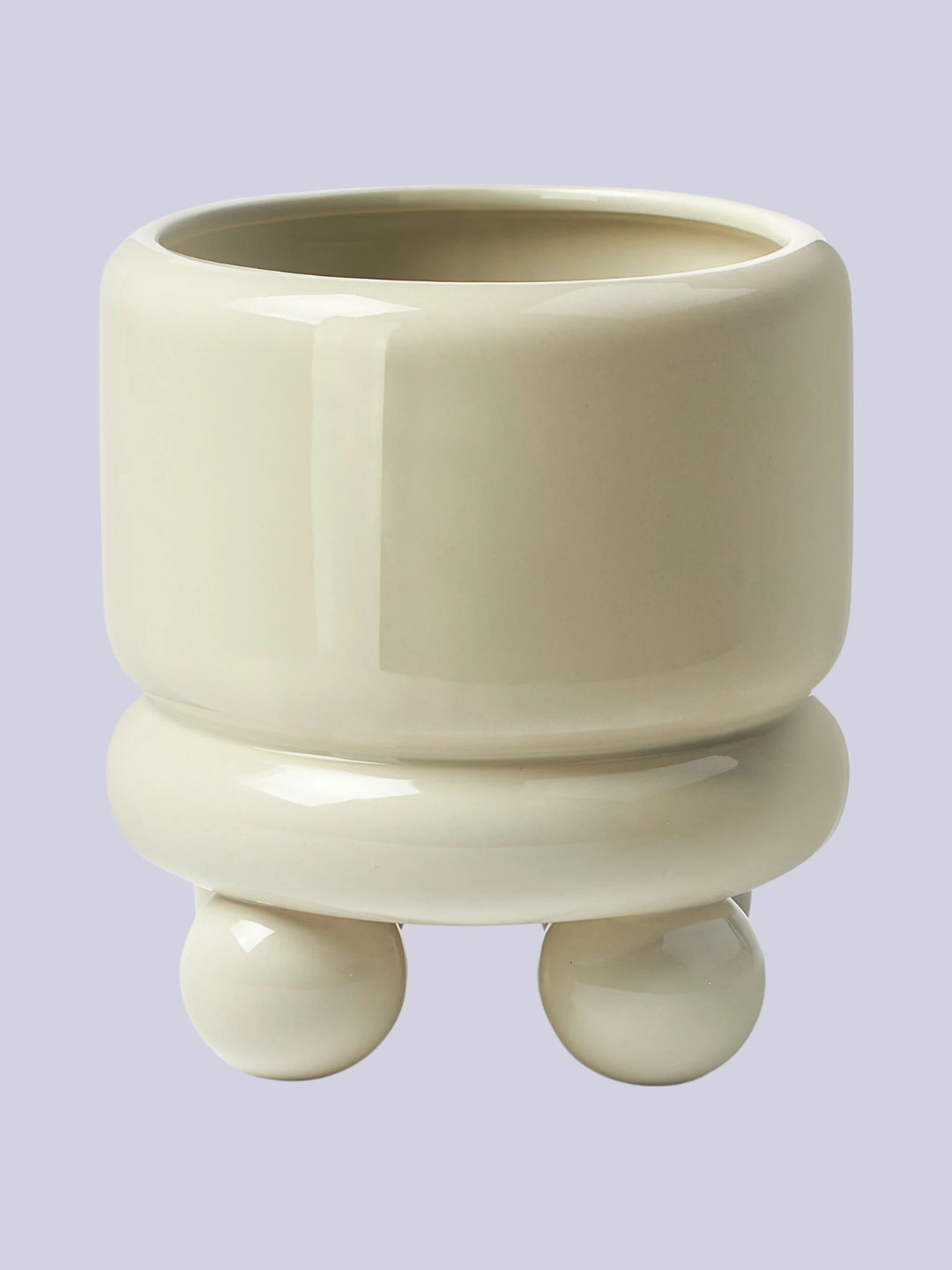 A pale olive green footed planter