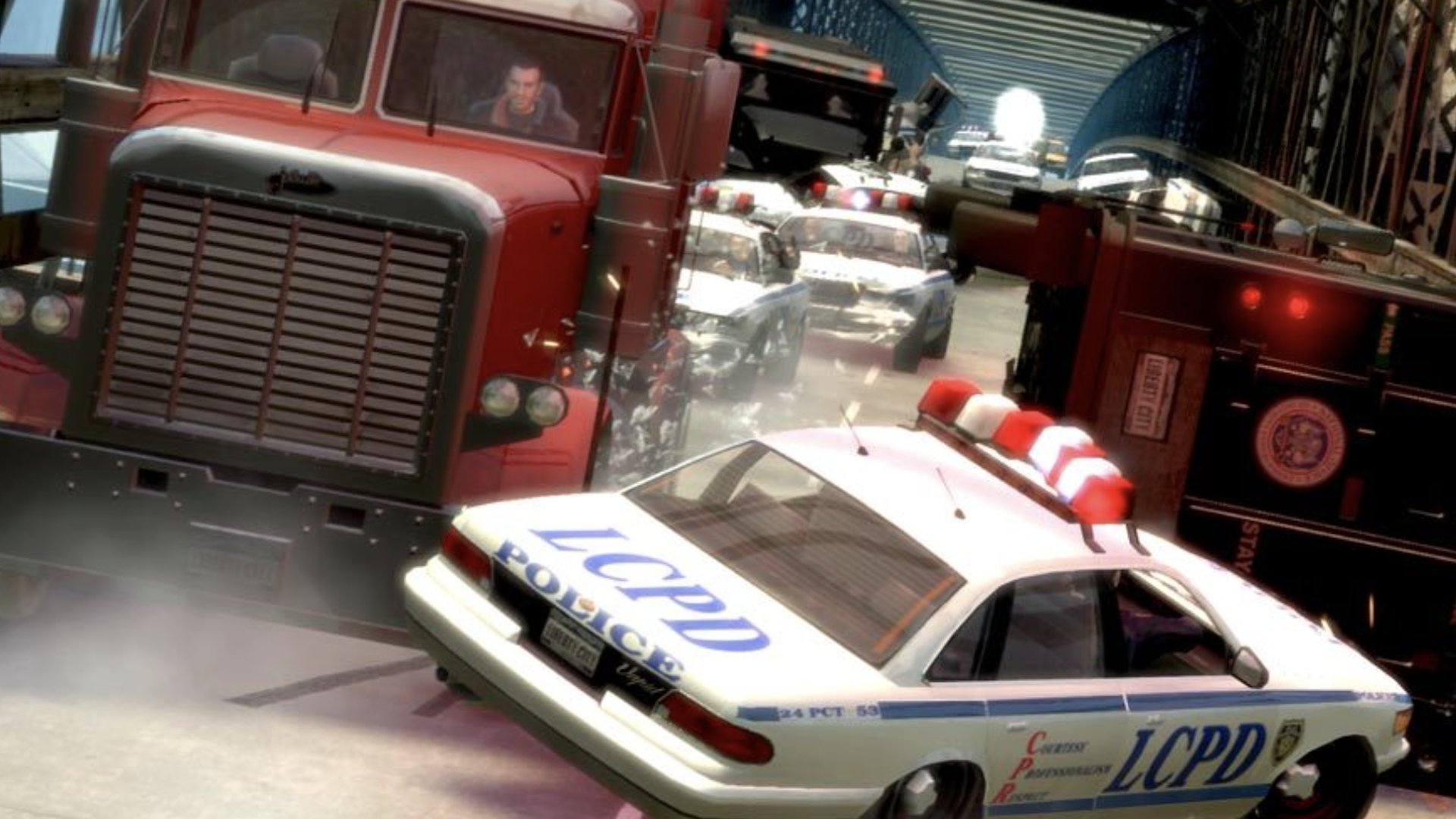 A truck smashes through a police car in an attempt to escape