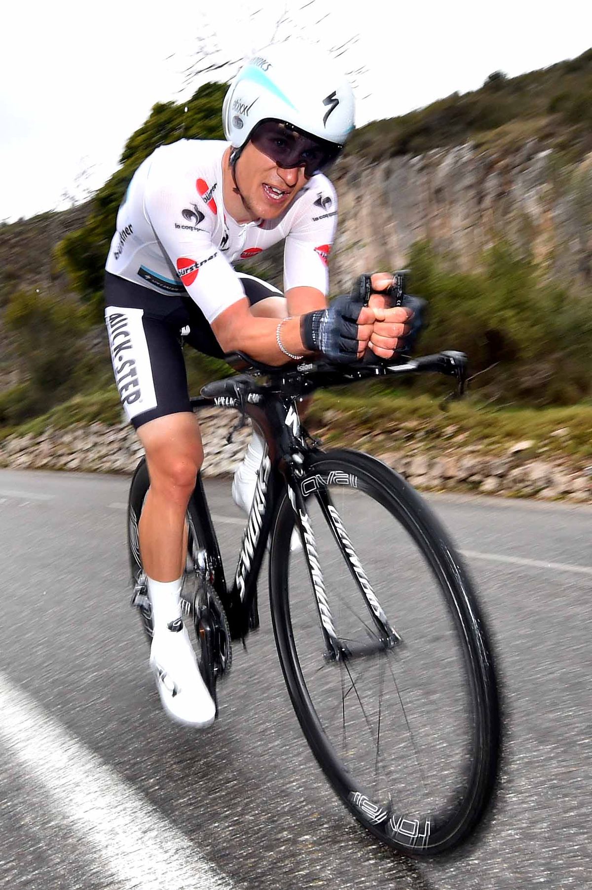 Michal Kwiatkowski wears the young rider's jersey
