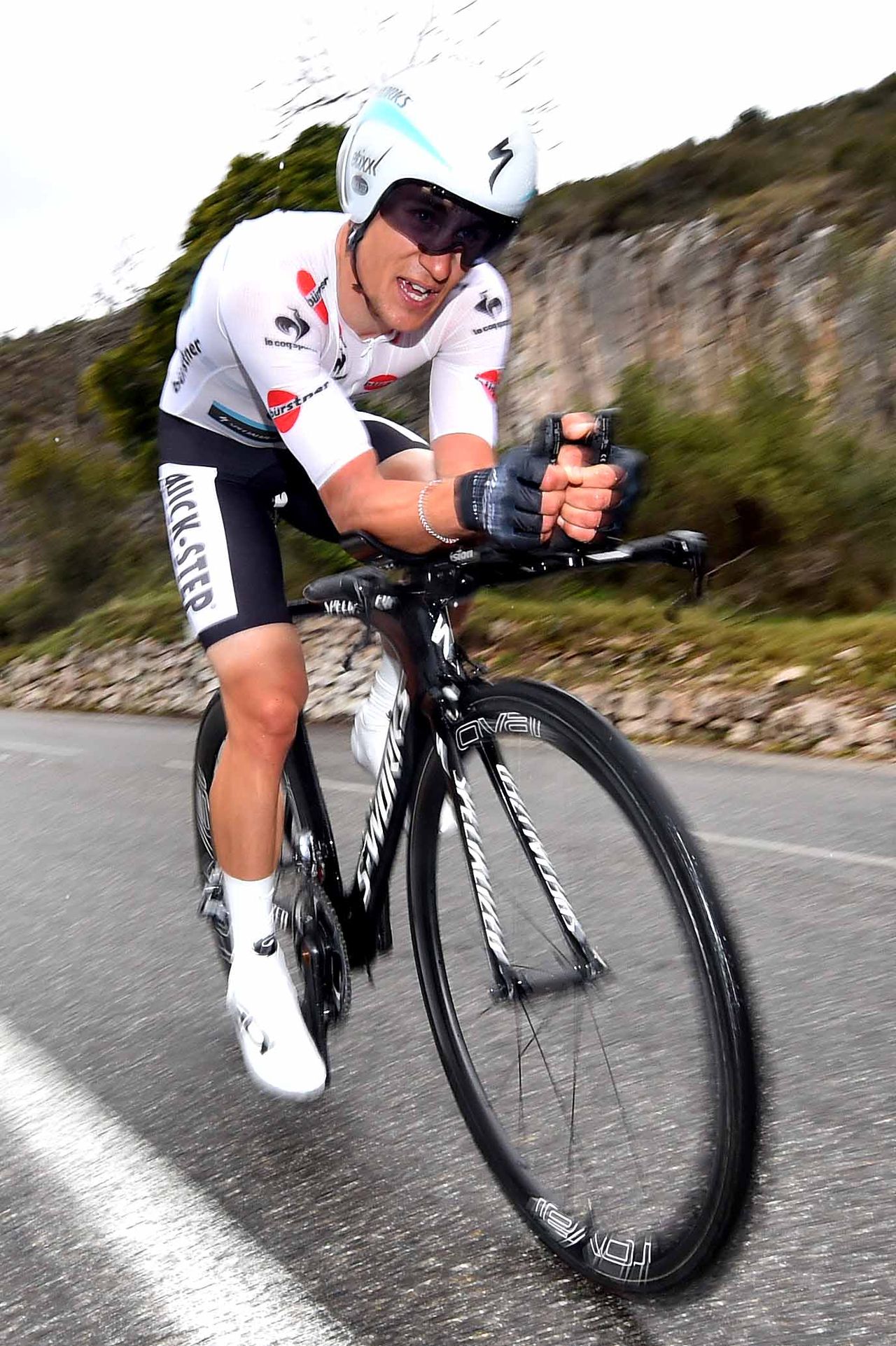 Michal Kwiatkowski wears the young rider's jersey