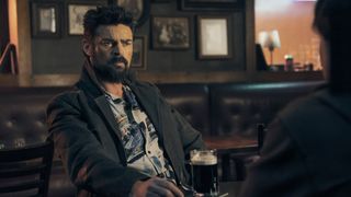 Billy Butcher sitting at a table in The Boys season 5 episode 3