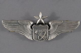Before the current NASA astronaut pin was adopted in 1963, the design was first introduced on U.S. Air Force (pictured) and U.S. Navy pilot astronaut wings that were awarded to members of the branches who flew into space.