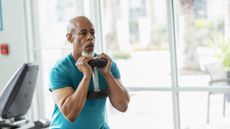 Man exercising with dumbbell