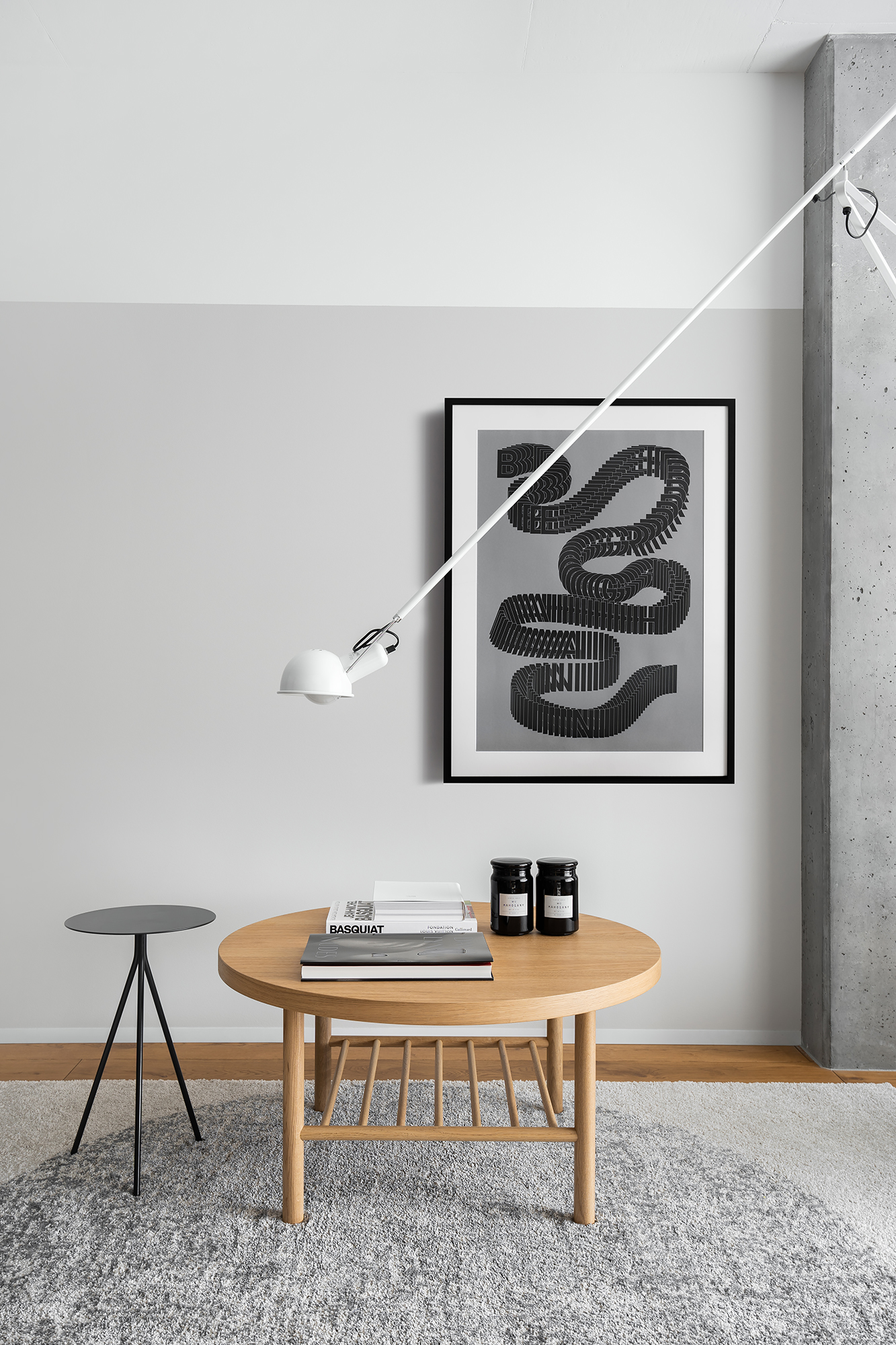 A long lighting piece over a dining table