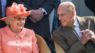 Queen Elizabeth II and Prince Philip, Duke of Edinburgh attend The OUT-SOURCING Inc Royal Windsor Cup polo match