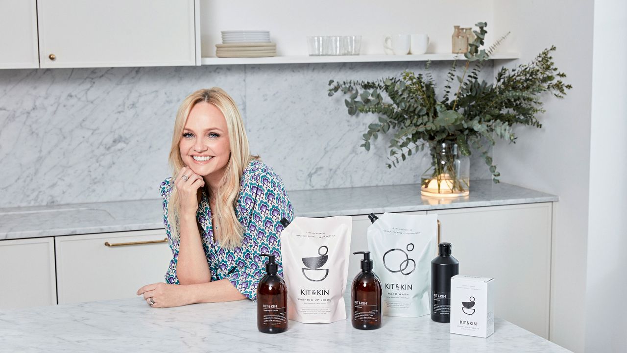 Emma Bunton in a kitchen beside her Kit &amp; Kin cleaning products