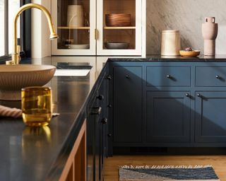 Dark blue kitchen cabinets