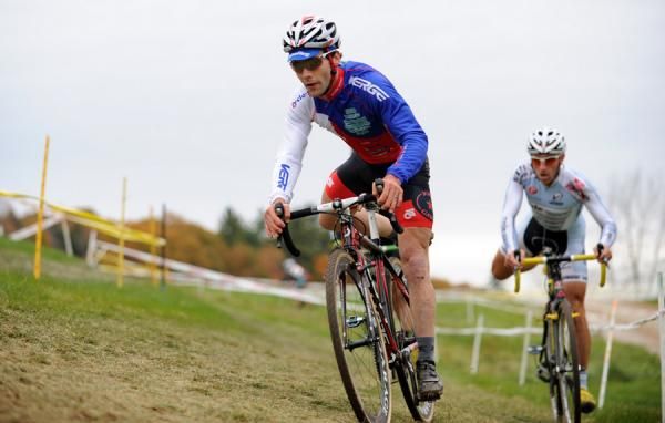 Justin Lindine (bikereg.com/Joe's Garage/Scott) leads Adam Myerson (Cycle-Smart) into the barriers.