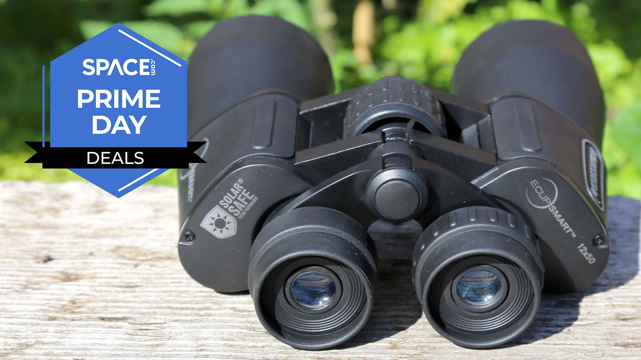 A pair of Celestron EclipSmart 12x50mm porro solar binoculars on a bench. 