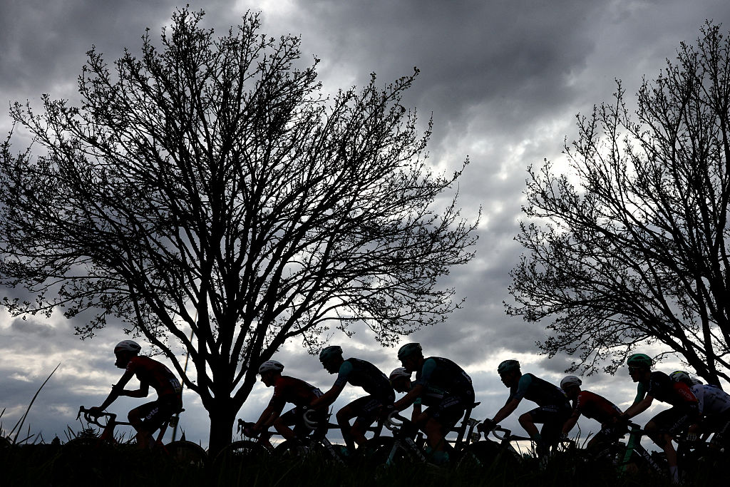 The pack rides during the 2nd stage of the Paris-Nice cycling race, 187 km between &amp;Eacute;p&amp;ocirc;ne and Montargis, on March 9, 2026. (Photo by Anne-Christine POUJOULAT / AFP)