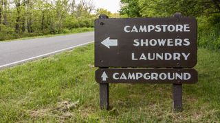 Directional signs at the entrance to a campgrounds